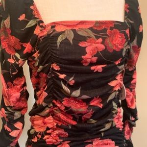 Jolie & Joy, black with red floral print, size L.